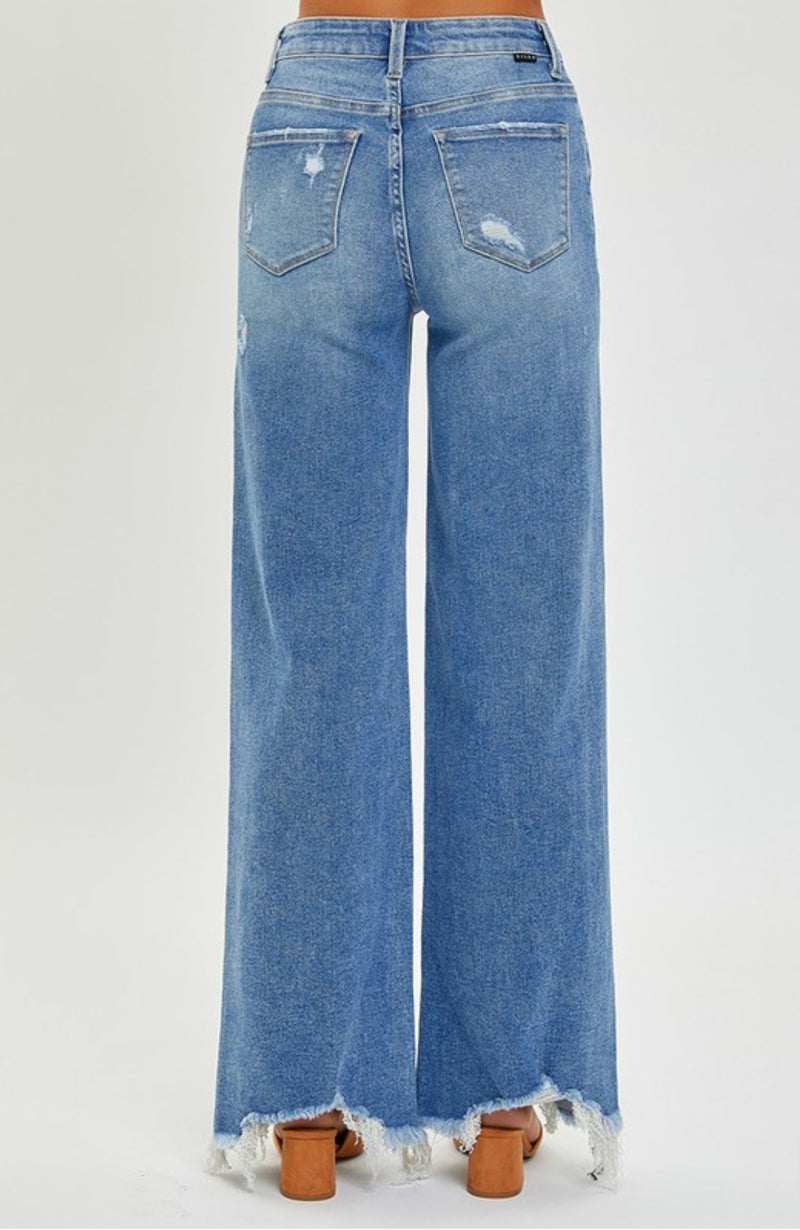 Risen High Rise Wide Frayed Hem Jeans