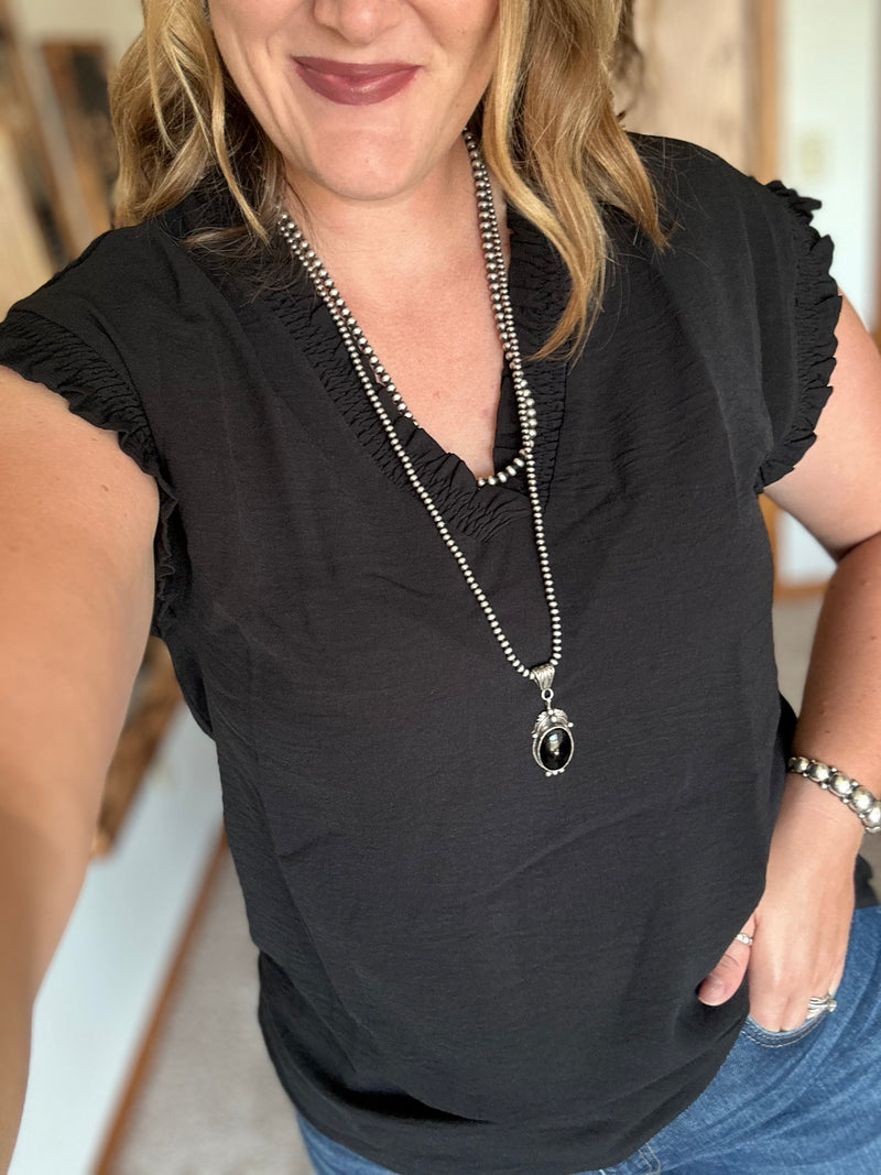 Black Ruffled V Neck Top
