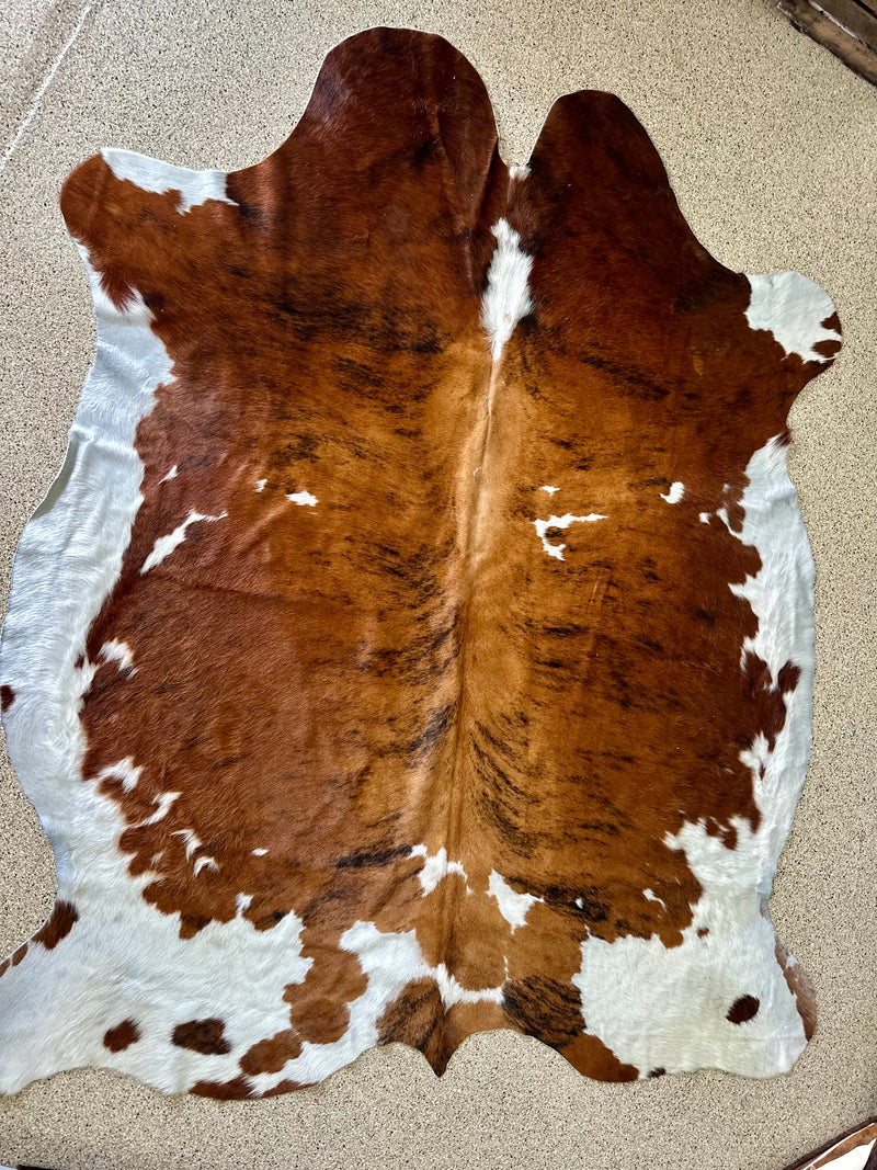 6 x 7 Brown/White Cowhide Rug