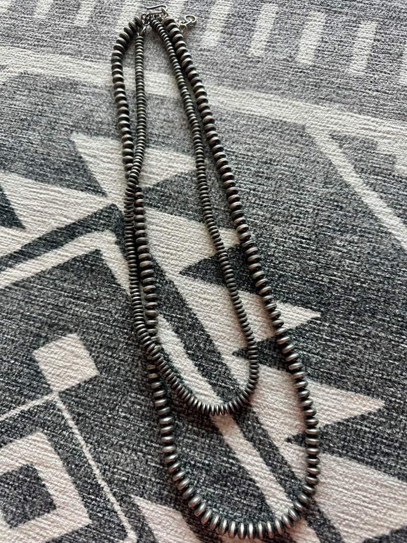 Saucer Pearl Necklaces