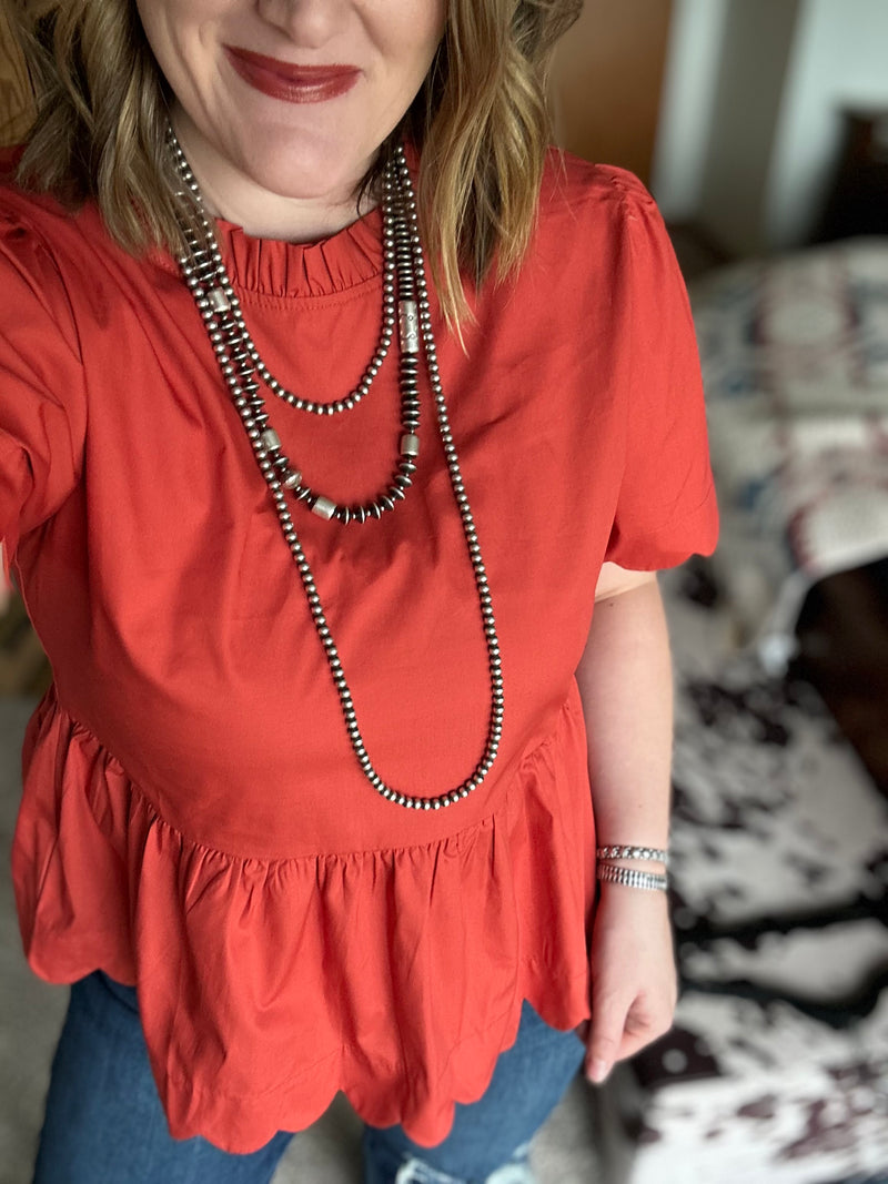 Rust Scalloped Peplum Top